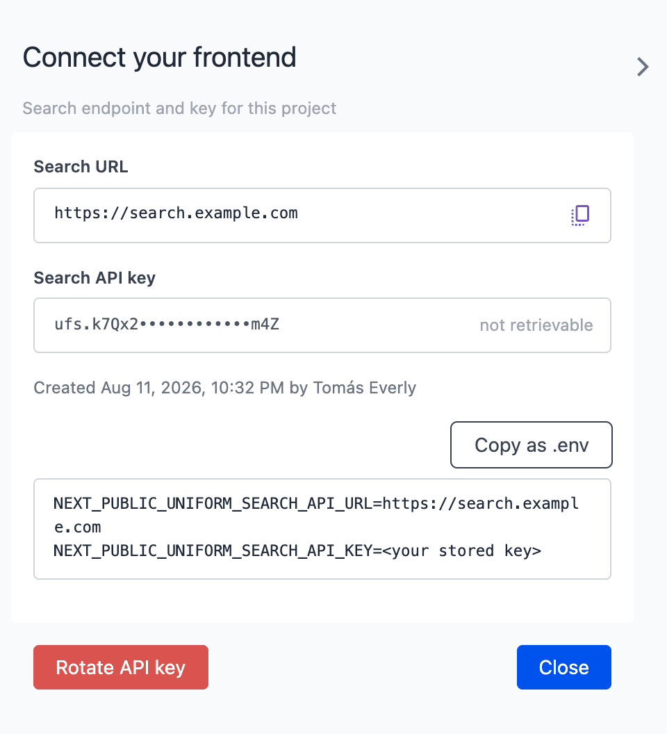 The Connect your frontend drawer with the Search URL, the masked Search API key marked not retrievable, the Created date and creator, the Copy as .env button with the two environment variables, and the Rotate API key and Close buttons.